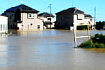 水に浸かった住宅の写真：エンターすると大きくなります